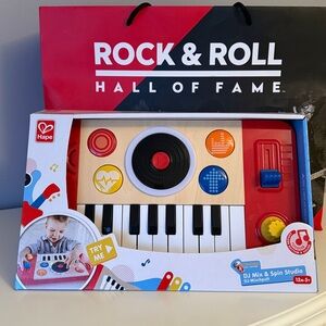 Hape DJ Mix & Spin Studio Toy - Red, Yellow, Blue